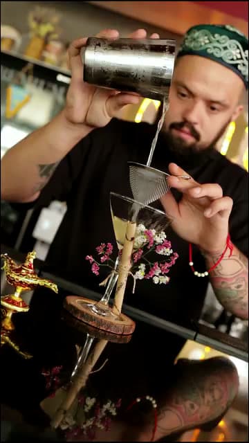 Signature cocktail crafted at the bar